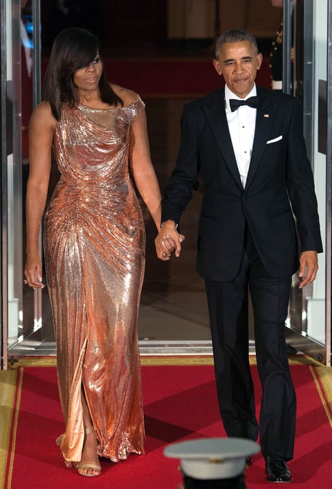 Dressed to impress in this liquid gold dress, check out that side swoop.