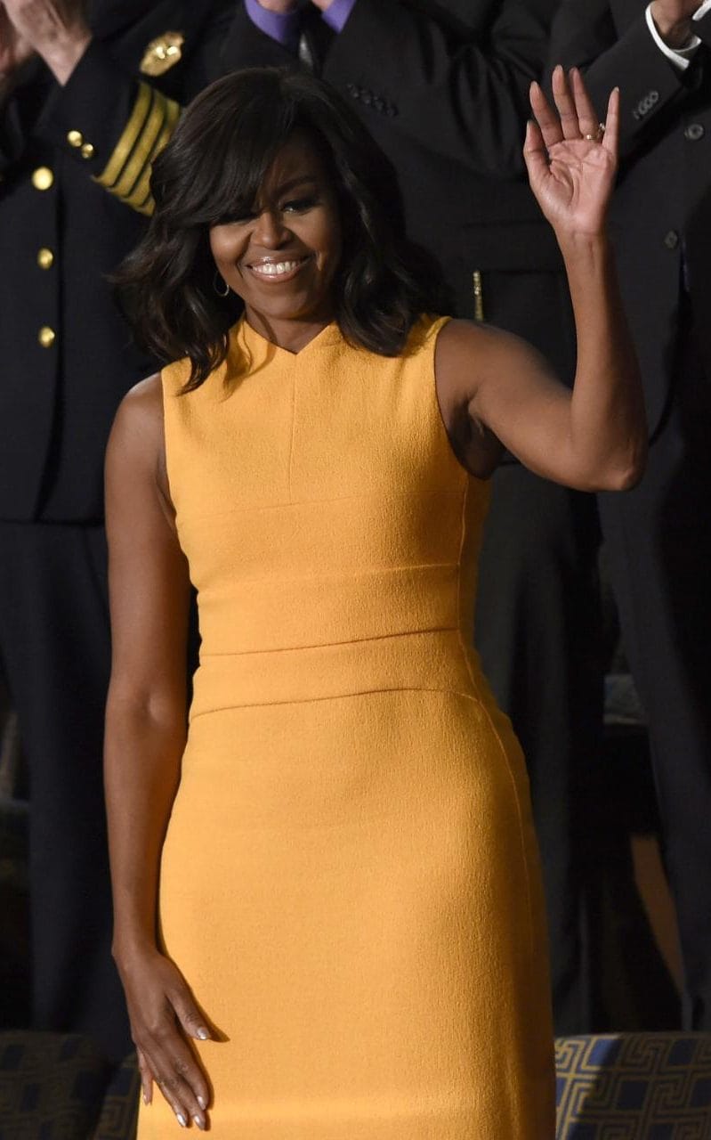 Michelle looking like a ray of sunshine in this clementine dress.