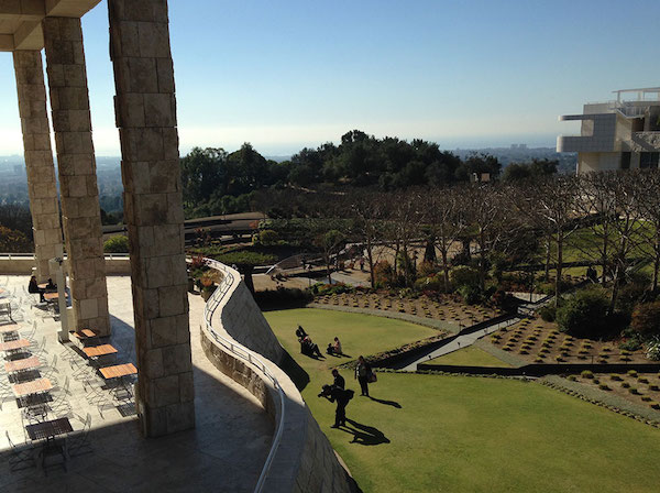 The Getty Center was kept safe during the fires but the shrubby hills in the area are burned black. The buildings are made of stone and glass and the whole site is designed to be fire-safe, with a sophisticated air filtration system, plants with the highest water content nearest the buildings, and a one million gallon water reserve tank. The garden still resonates a clear calm.