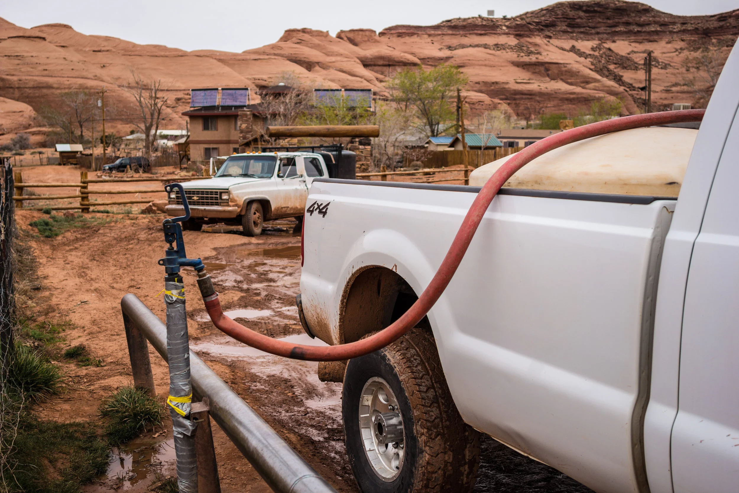 Will Yazzie's tank slowly fills in the back of his truck. This is the only way his family has access to clean drinking water. It takes about an hour each way to drive to the water tap at the center of the community and sometimes waiting for your turn in line can take even longer. 