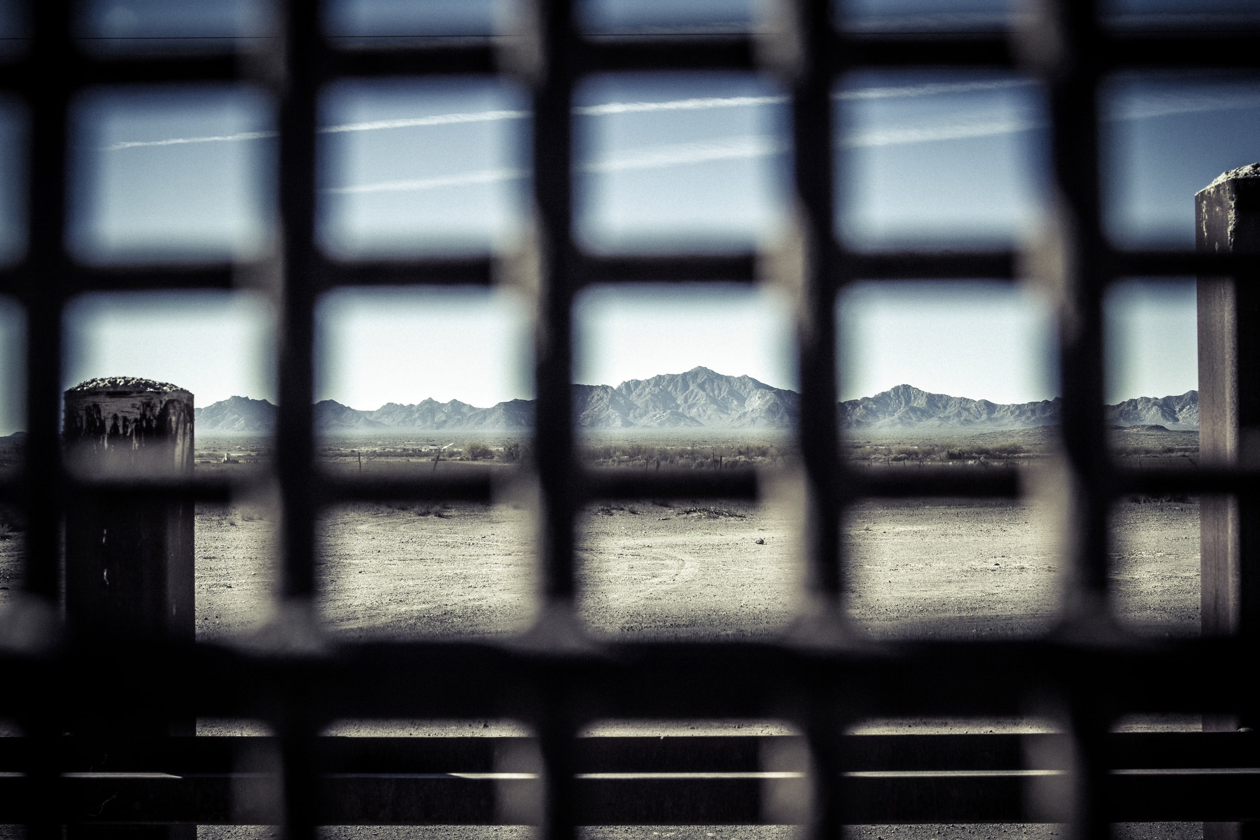 In a dusty corner of Organ Pipe National Monument, near where this image was taken, a path leads to a memorial where Chris Eggle was killed by a cartel hit squad in 2002. Chris Eggle was a law enforcement Park Ranger and his death prompted park managers to close nearly 70 percent of the monument in 2003. Though some small areas were later reopened, Organ Pipe remained largely closed to the public for over a decade.