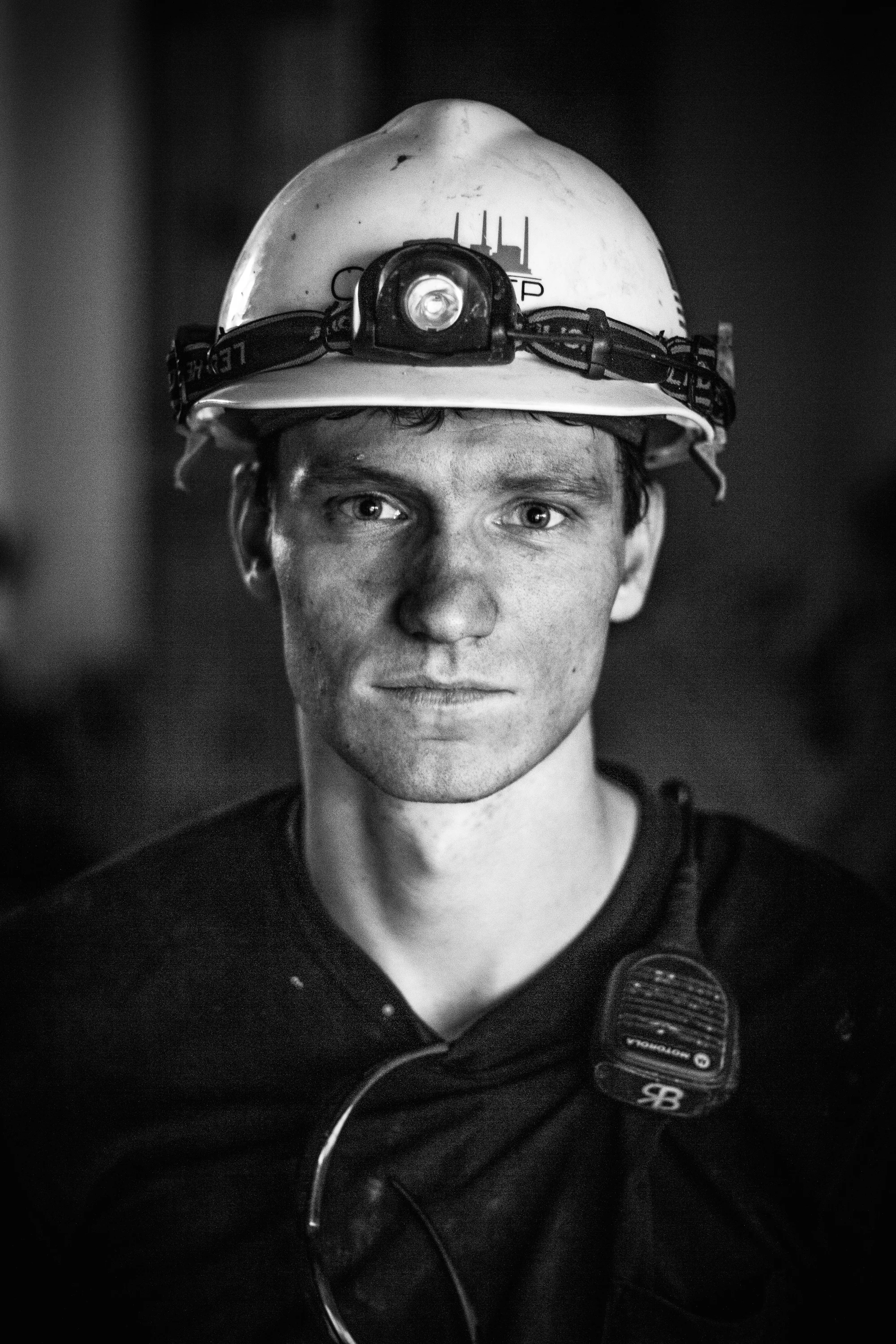 Working in the Coal fired power plant is a hot and dirty job but the pay is good. Ryan started out making $24 an hour with many opportunities for overtime. But he was the last employee to be hired and could be the first to be let go if the plant closes half of its units ahead of schedule. In the portraits below he poses for me and momentarily lets his tiresome night schedule pull his gaze into the distance.