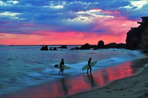 surfing wave sunset.jpg