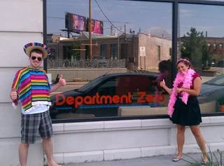 Interns Alex & Alexa after the found the box of costumes kept in storage.