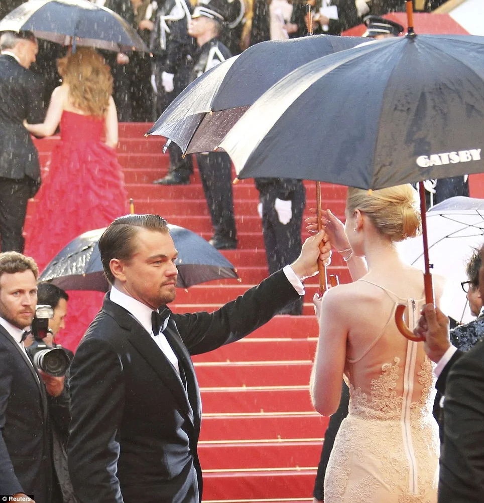  Rain drenched the red carpet prior to the Great Gatsby screening at Cannes in 2013. Lucky Leo had a branded umbrella on hand.