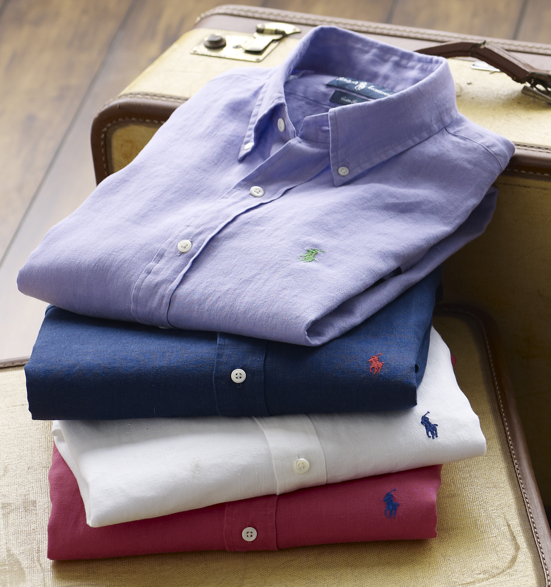 polo stack on suitcase.jpg