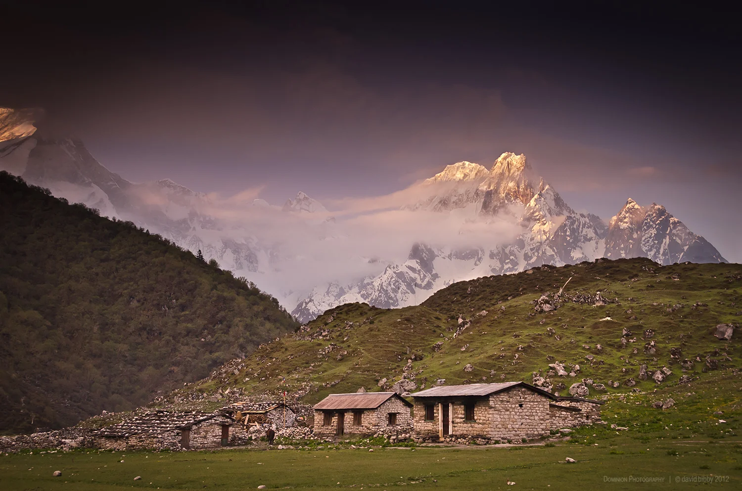 Sunrise at Bimtang. The peak in the centre of the shot is Phungi (6538m). The mountain at far left is the lower slopes of Manaslu. Manaslu Conservation Area.