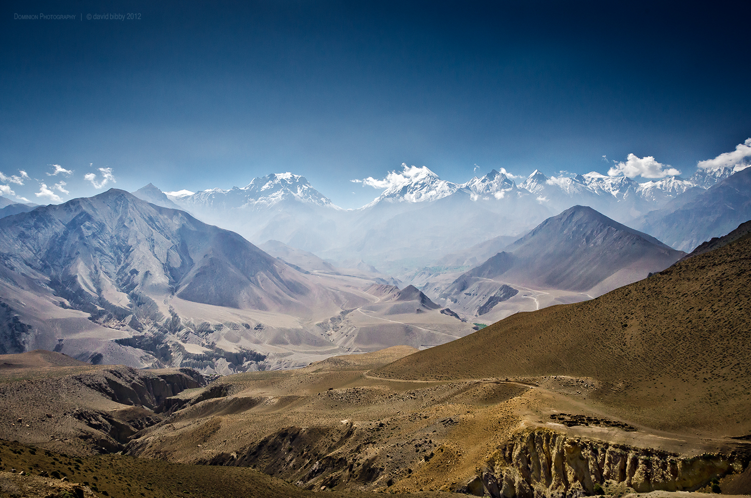  View up the Jhong Khola valley. The Thorong La is the low point on the horizon. Mustang district. 