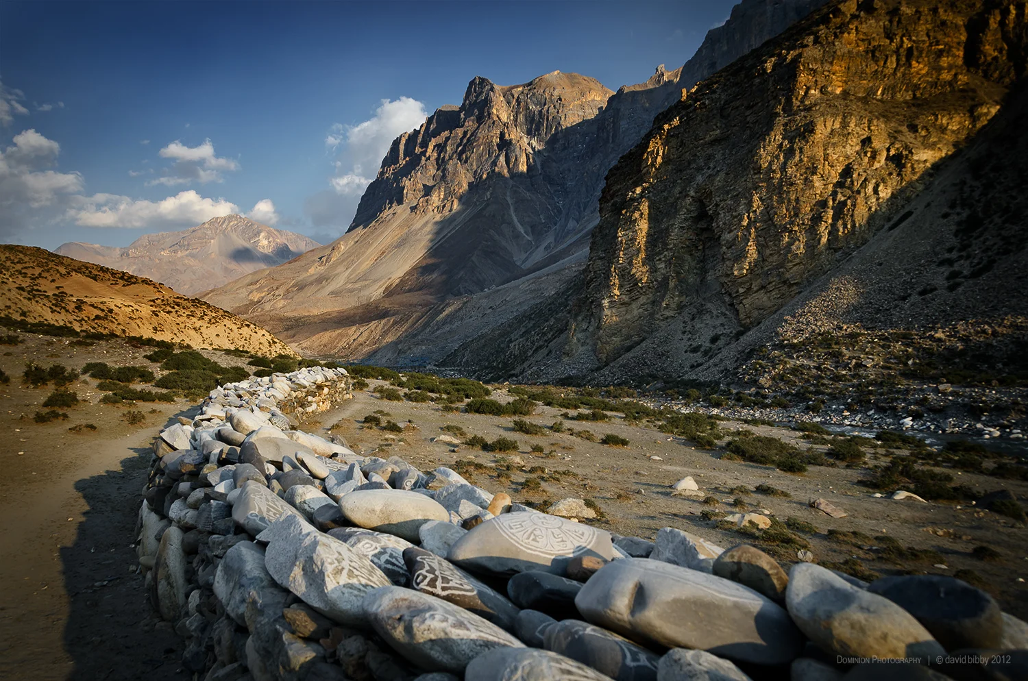 Mani wall outside Chharka Bhot. Looking east along the Chharka Khola valley. Dolpa district.