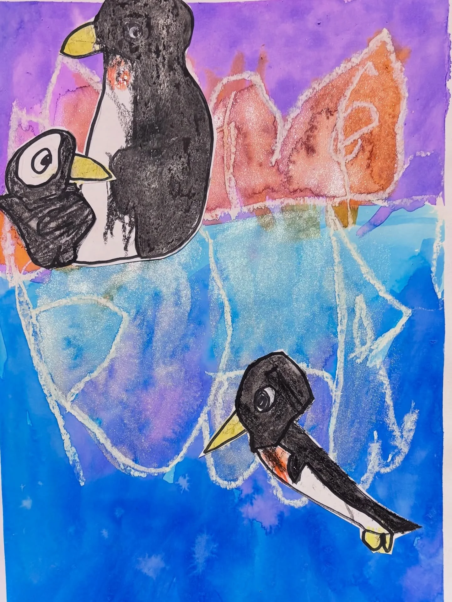 This week, our Monday #StartWithArt #kindergartenart class discovered the magic of oil pastel and watercolour resist. We used white oil pastels to draw icebergs on white paper, and then revealed our invisible lines by painting over our paper with wat