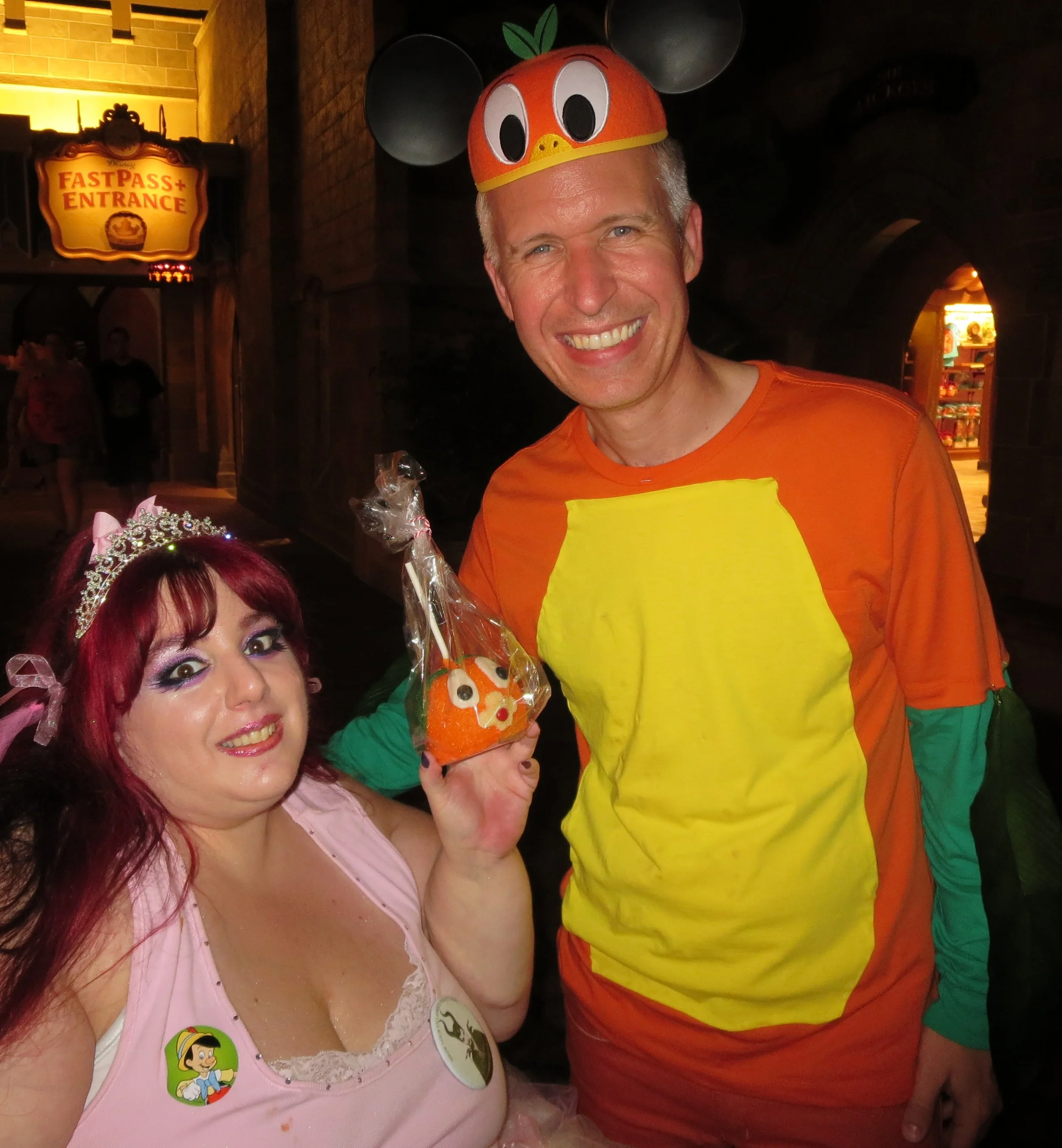 Orange Bird Caramel Apples with Steve from the Official Disney Parks Blog showing his Disney Side