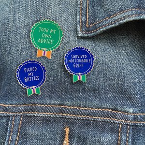 Everyday bravery pins by Emily McDowell