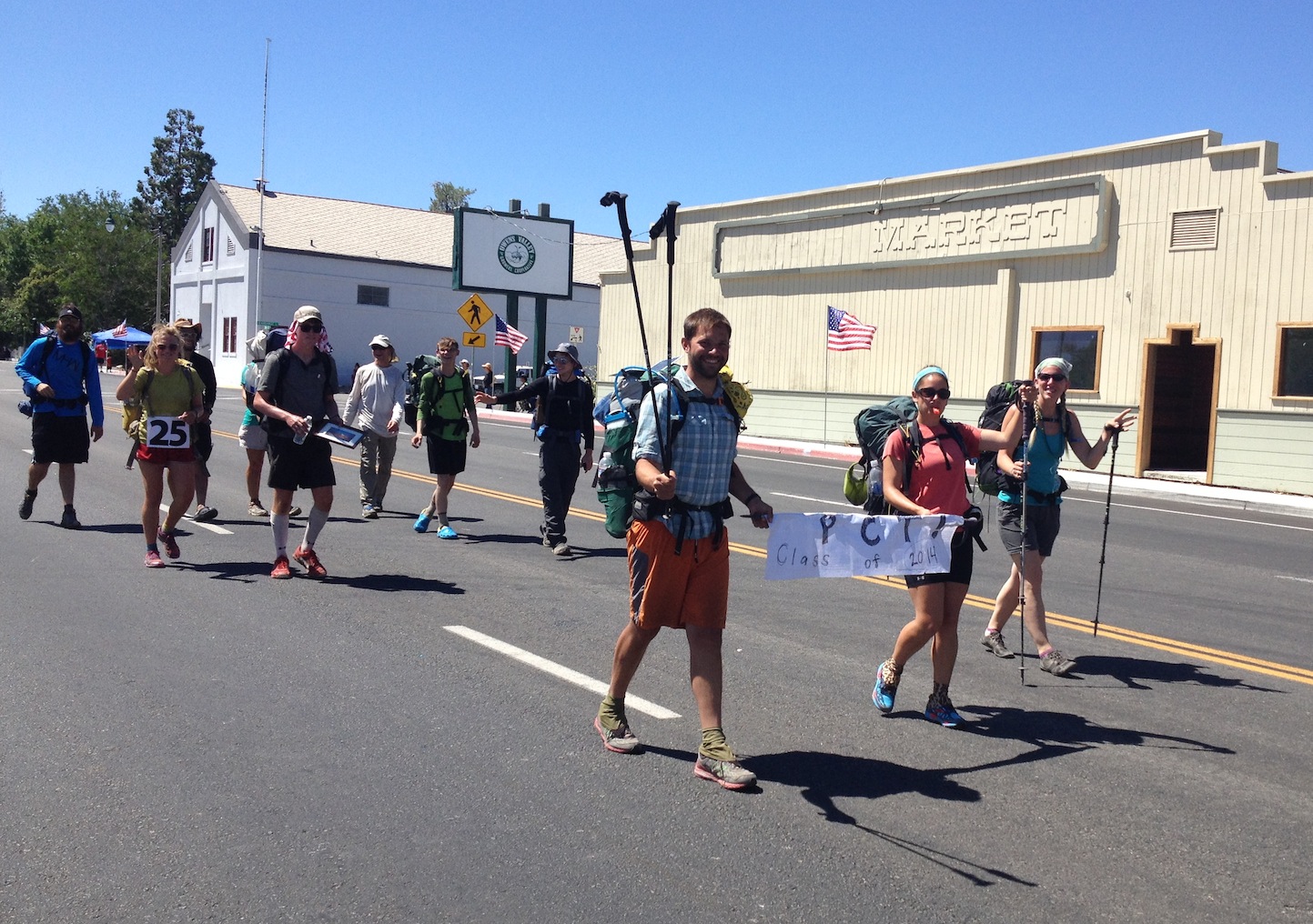 PCT hikers marching in the 4th of July Parade in Independence