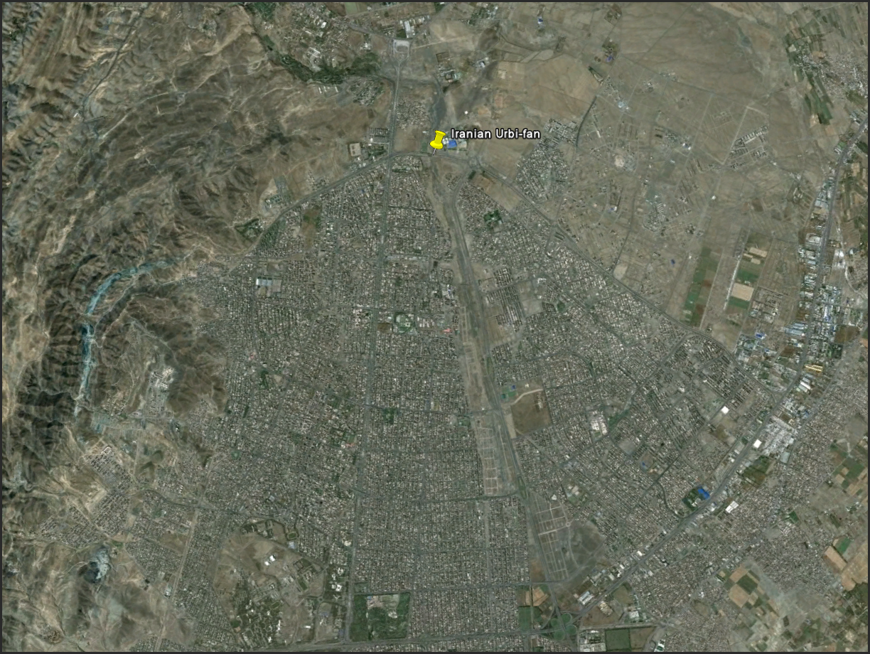 One of the most densely developed, nearly ideally shaped alluvial fans that I have yet come across...Nice to see that the road and street alignment is concordant with the radial geometry of the fan. In some places I have worked, it is more common to see a grid slammed on the landscape with minimal regard to topography.
