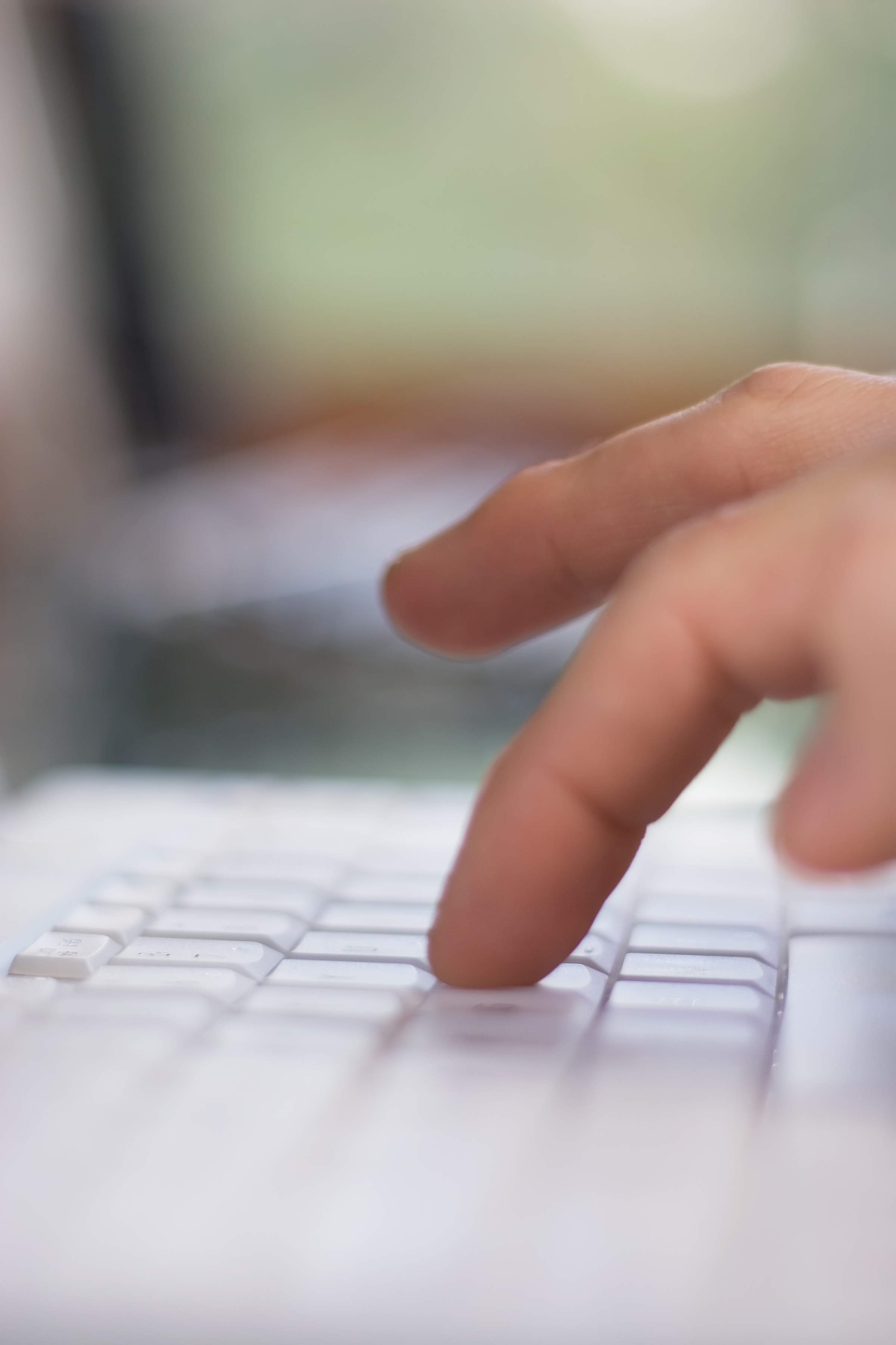 office staff typing on a keyboard