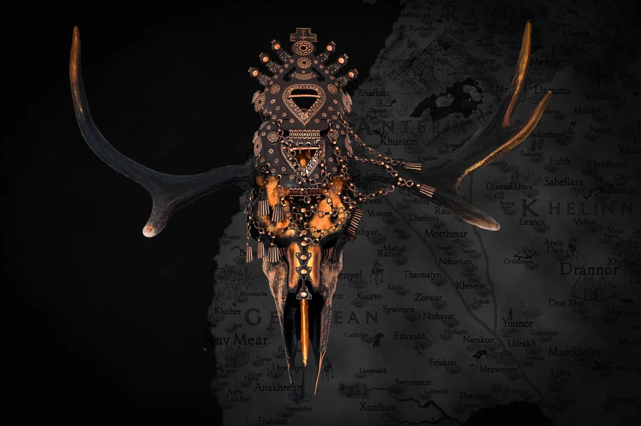 Temyn - The curator of Rav Mear with the world of Xhaimera created by Leo Flavum in the background. 