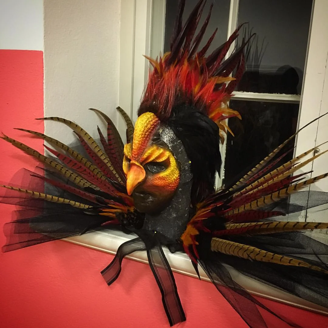 Petra Shara Stoor also works as a SFX-makeup artist and mask maker (www.sharacreations.com). She has created a fire phoenix inspirated mask and costume that will be part of "Midvinterglöd" (midwinterglow) 12th December in Jättendal, Sweden. 