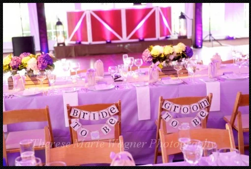 Our Bride-to-Be and Groom-to-Be chair banners, with Jardiniere's hydrangea floral arrangements.