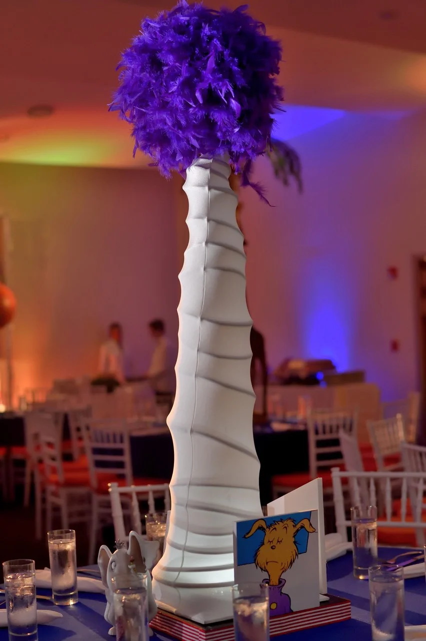 This fun glowing lantern, combined with images and figurines, represented Dr. Seuss, the celebrant's favorite author