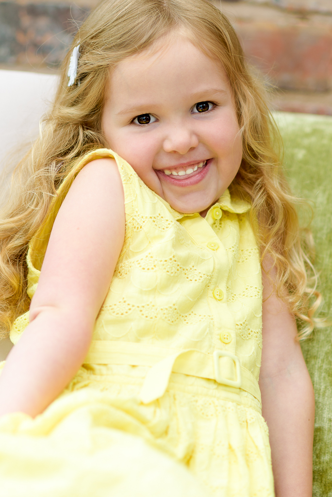 Family portrait of a happy, smiling young girl