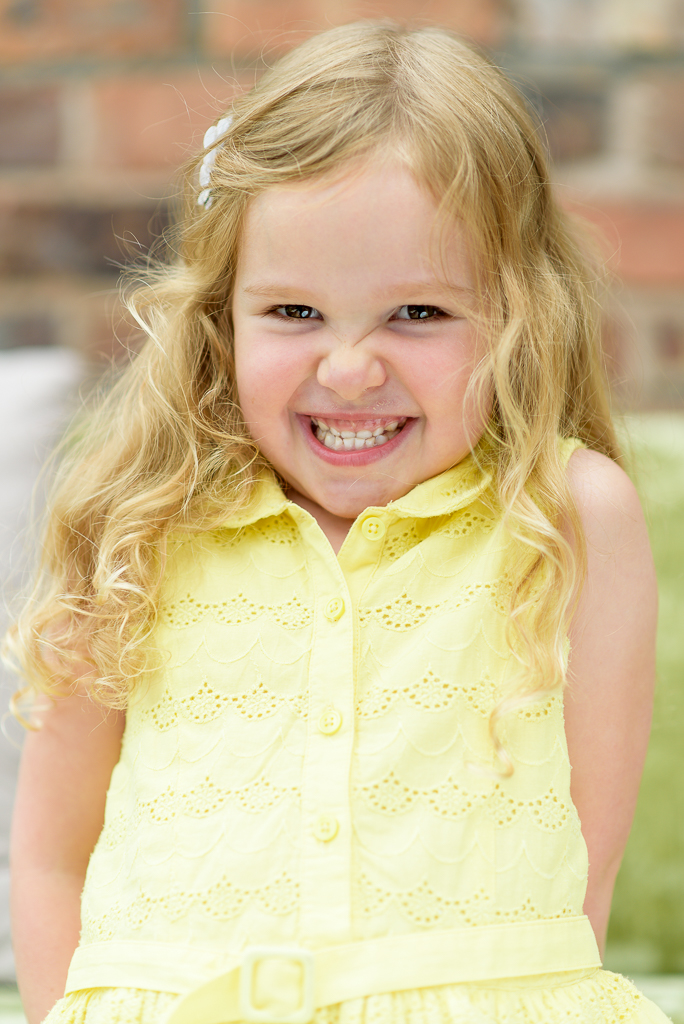 Family portrait of a happy, smiling young girl