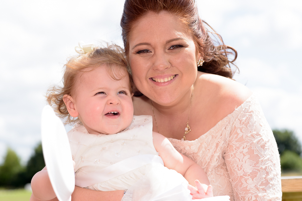 Family portrait of a happy, smiling mother and baby girl