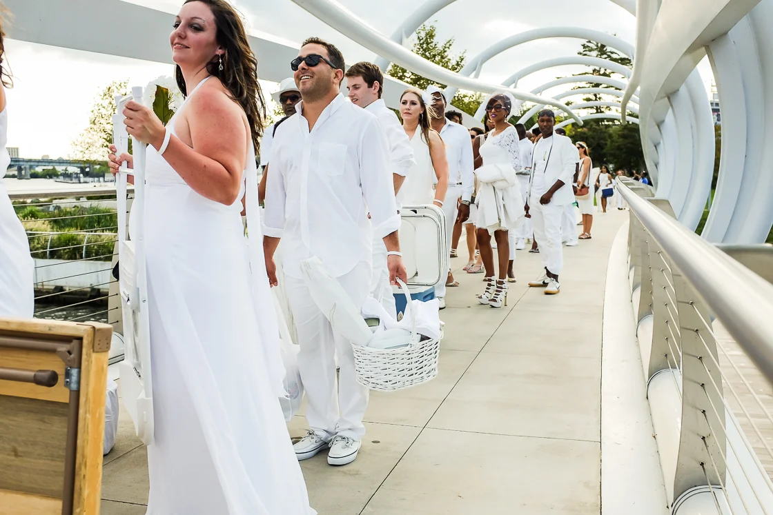 Guests await entrance along the Yards Park bridge, which provided a stunning backdrop for their introduction to the party in Navy Yard.