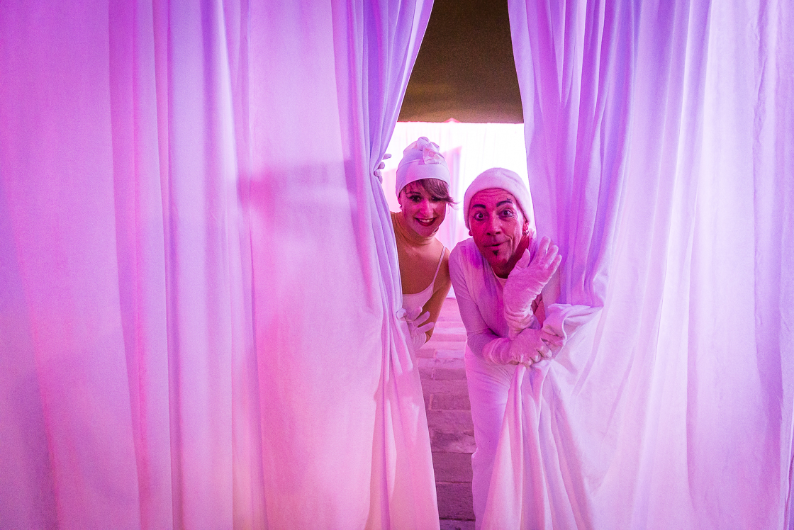 After entering the backyard maze, guests were followed by white-clad mimes Shelly Gui and Brian Z. of Cast of Thousands as they made their way through the twists and turns.