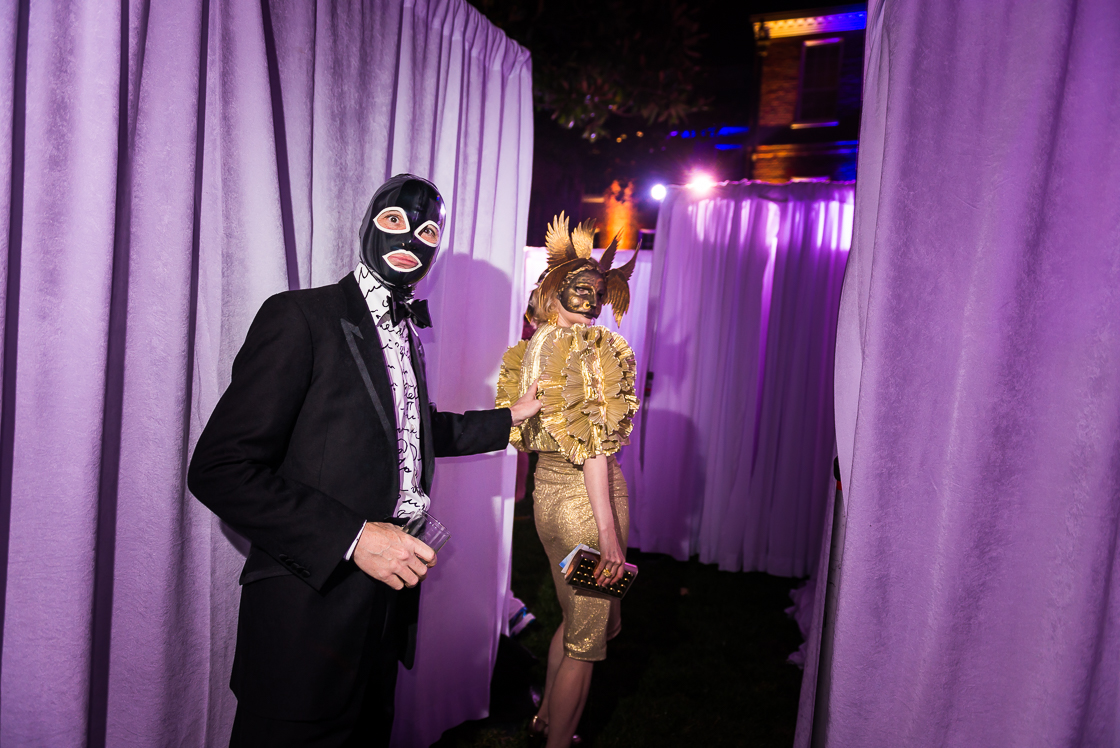 Guests Tim and Dana Rooney try to find their way out of the maze at the annual Night Nouveau benefit party at the historic Halcyon House in Georgetown.