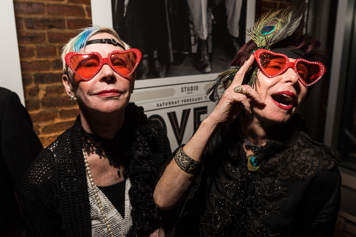 Artists Betsy Stewart and Annette Polan (from left) get theatrical with some flamboyant sunglasses.