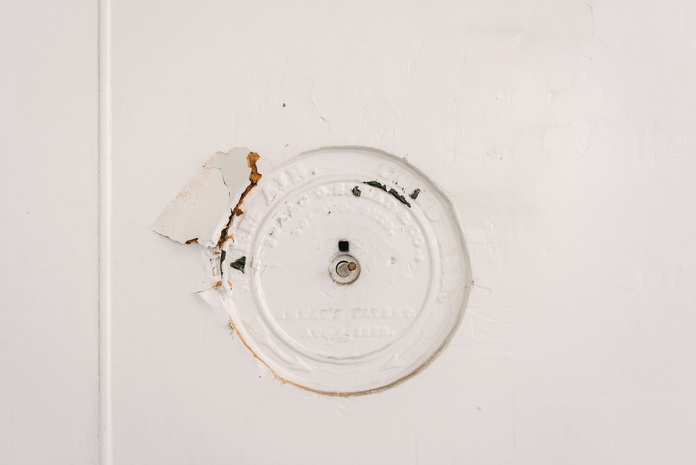 An old gas line into a classroom was used to light gas lamps when the older portion of the school was built in the 1880's. 