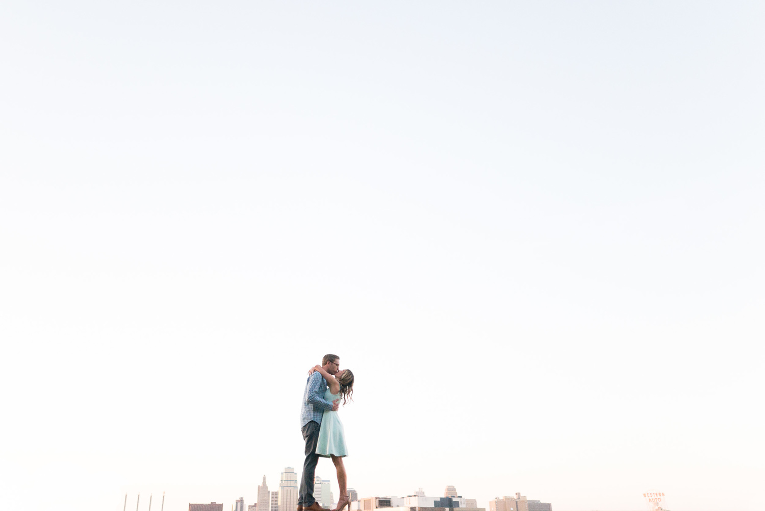 Kansas City Skyline Creative Engagement Portraits Wedding Photographer