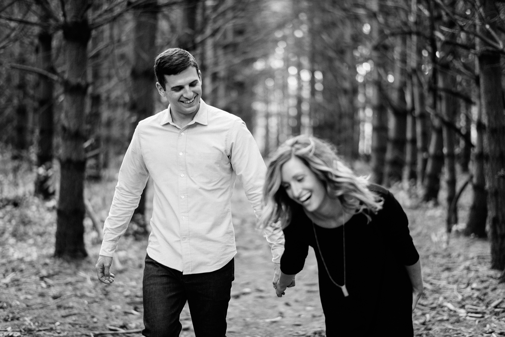 Wooded forest engagement portrait session in Kansas City.