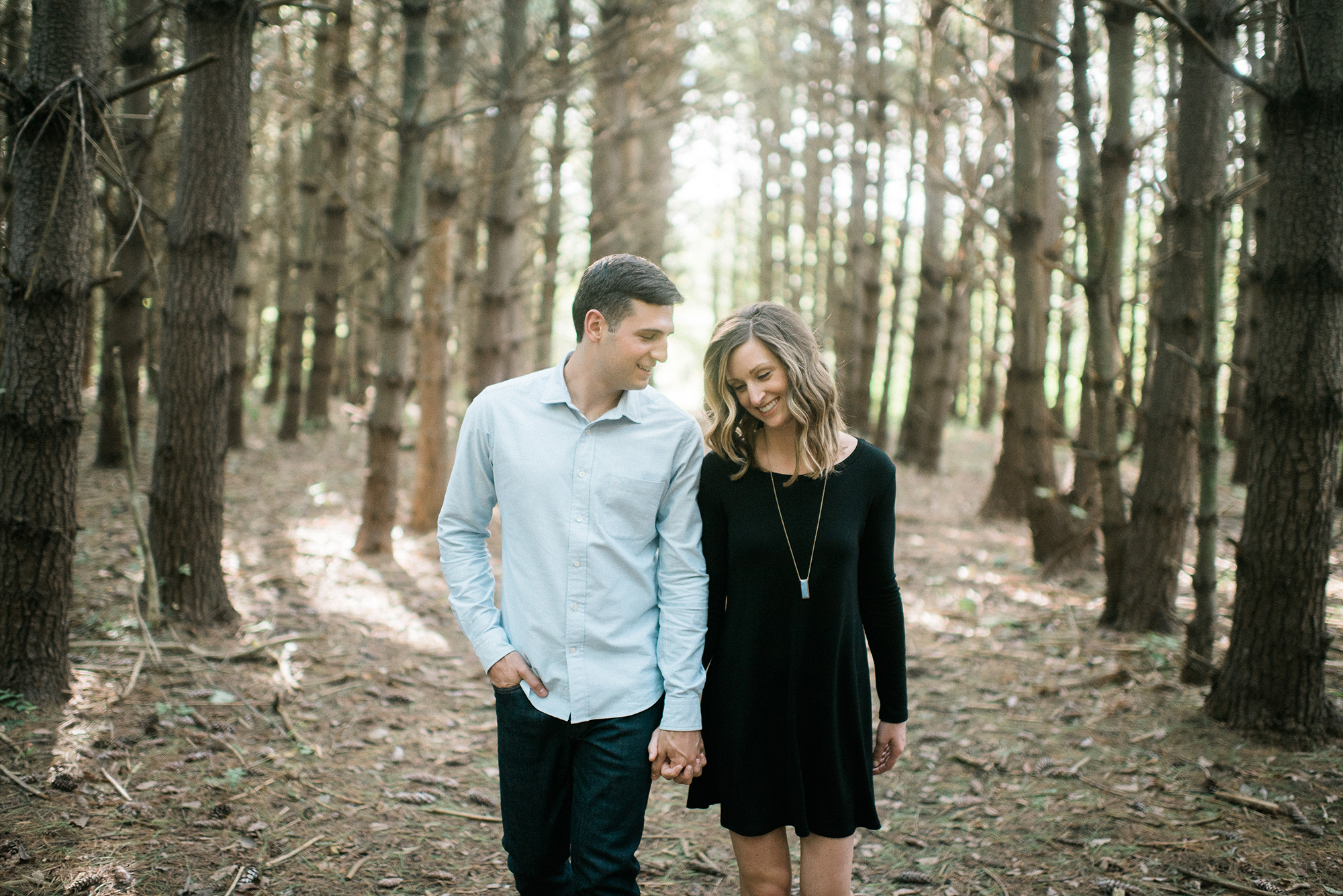 Wooded forest engagement portrait session in Kansas City.