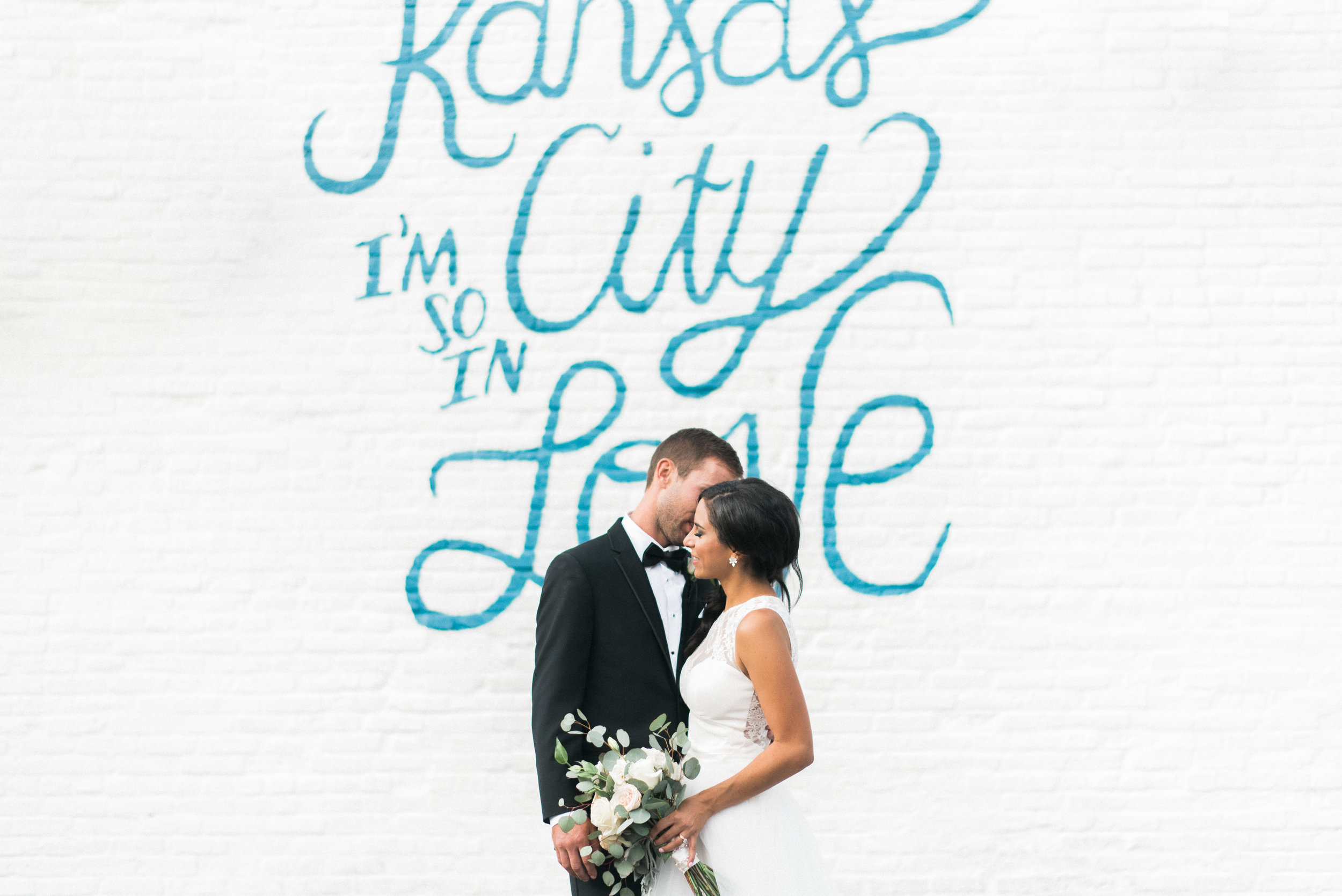 Derek Fisher & Sarah Gayed's wedding photographs by Kansas City wedding and portrait photographer Rusty Wright.