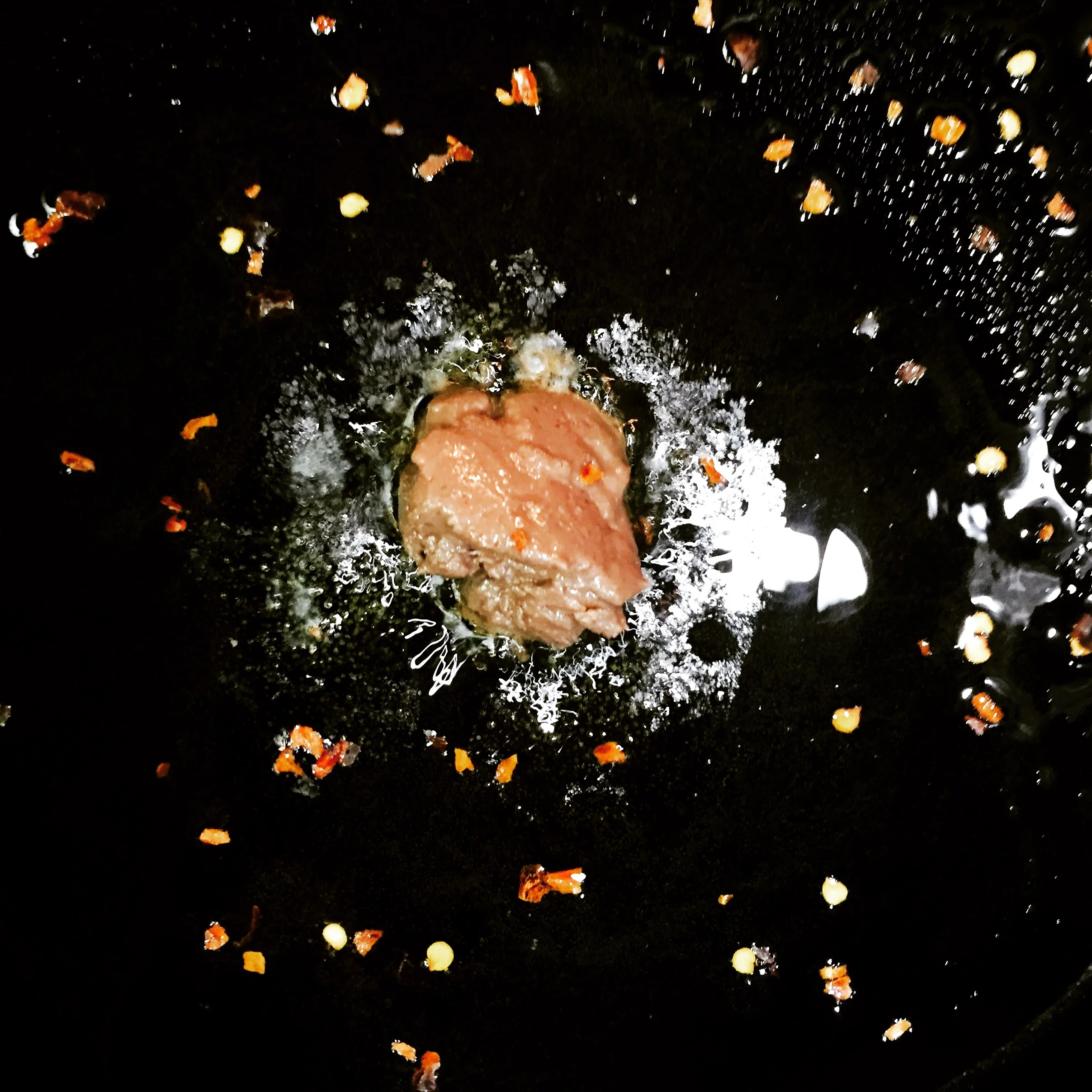 Anchovy paste and red pepper flakes flavoring the oil.