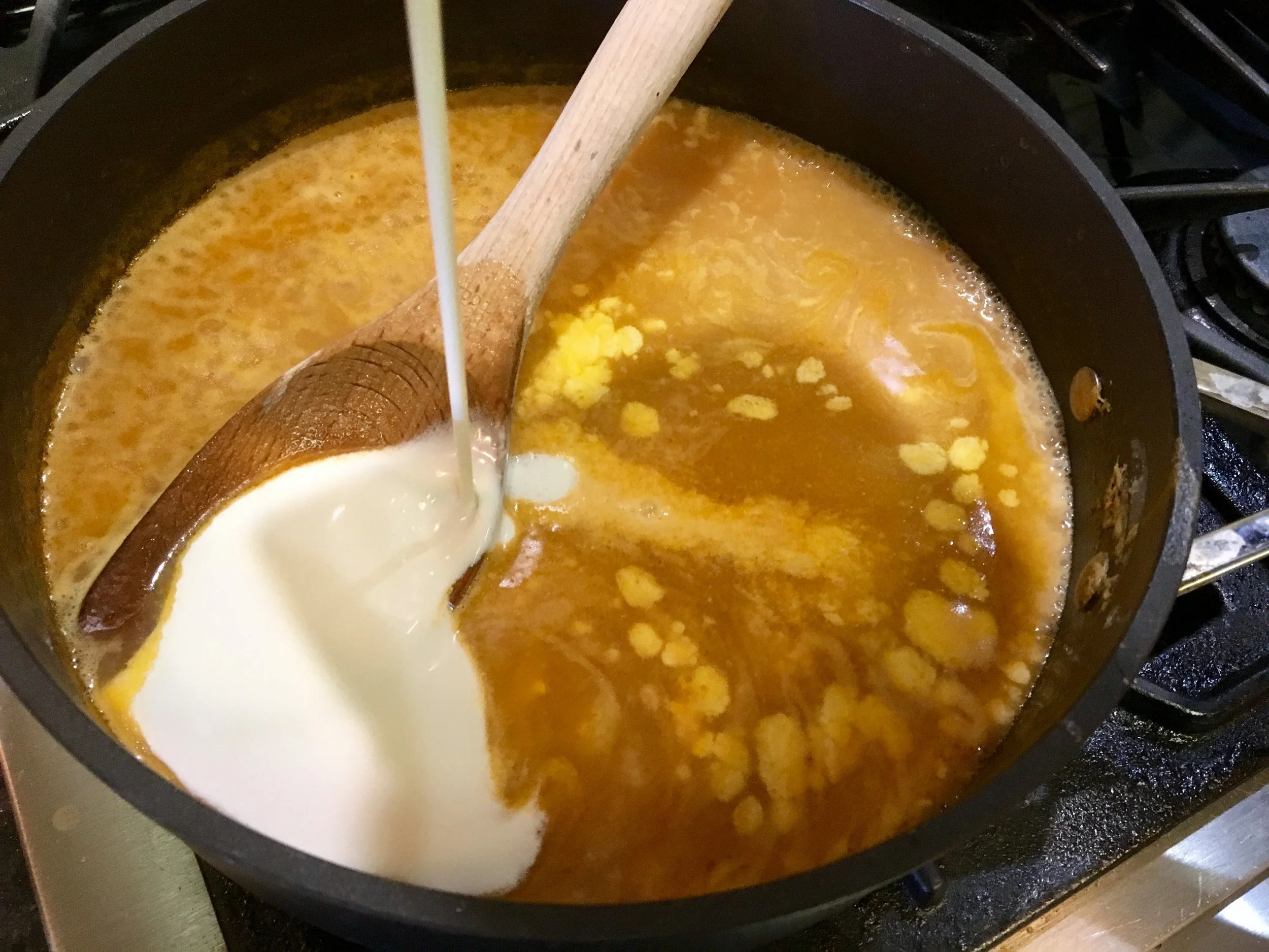 Adding a good "slurp" of heavy cream! 