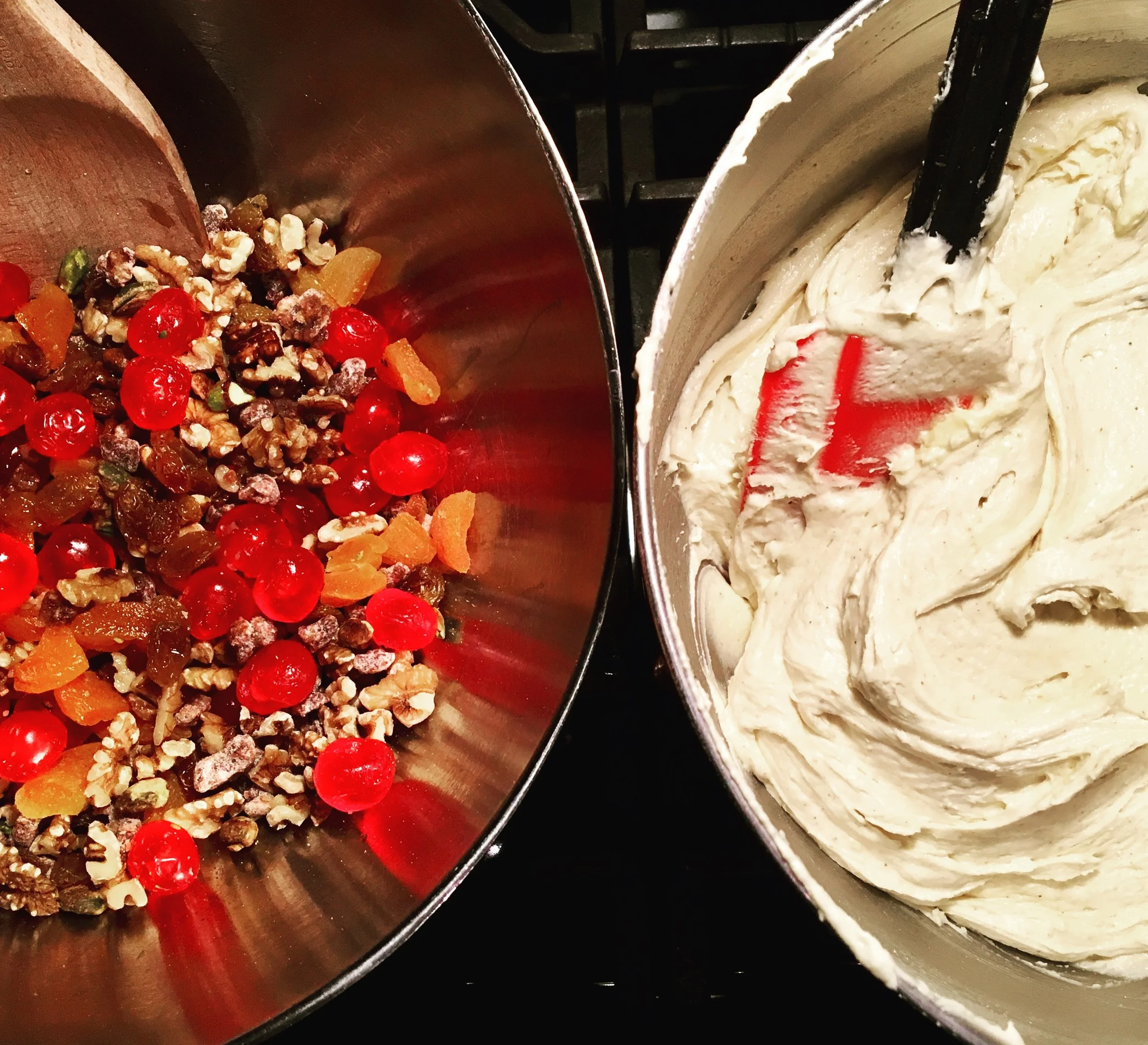 Fold in the cake batter with the dried fruits and nuts.