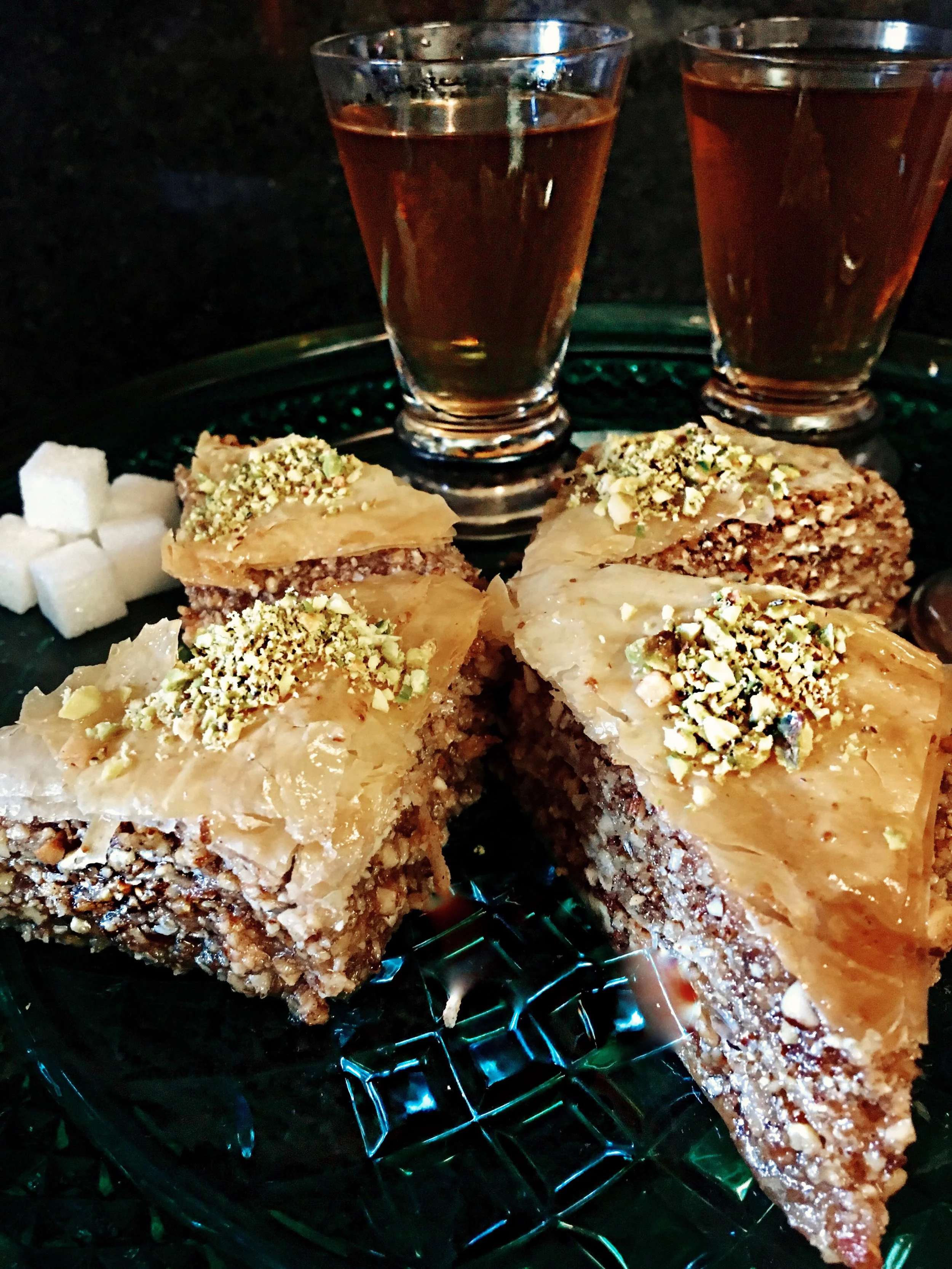 Serve with hot Persian black tea steeped with cardamom pods and dried rose buds.... heaven! 