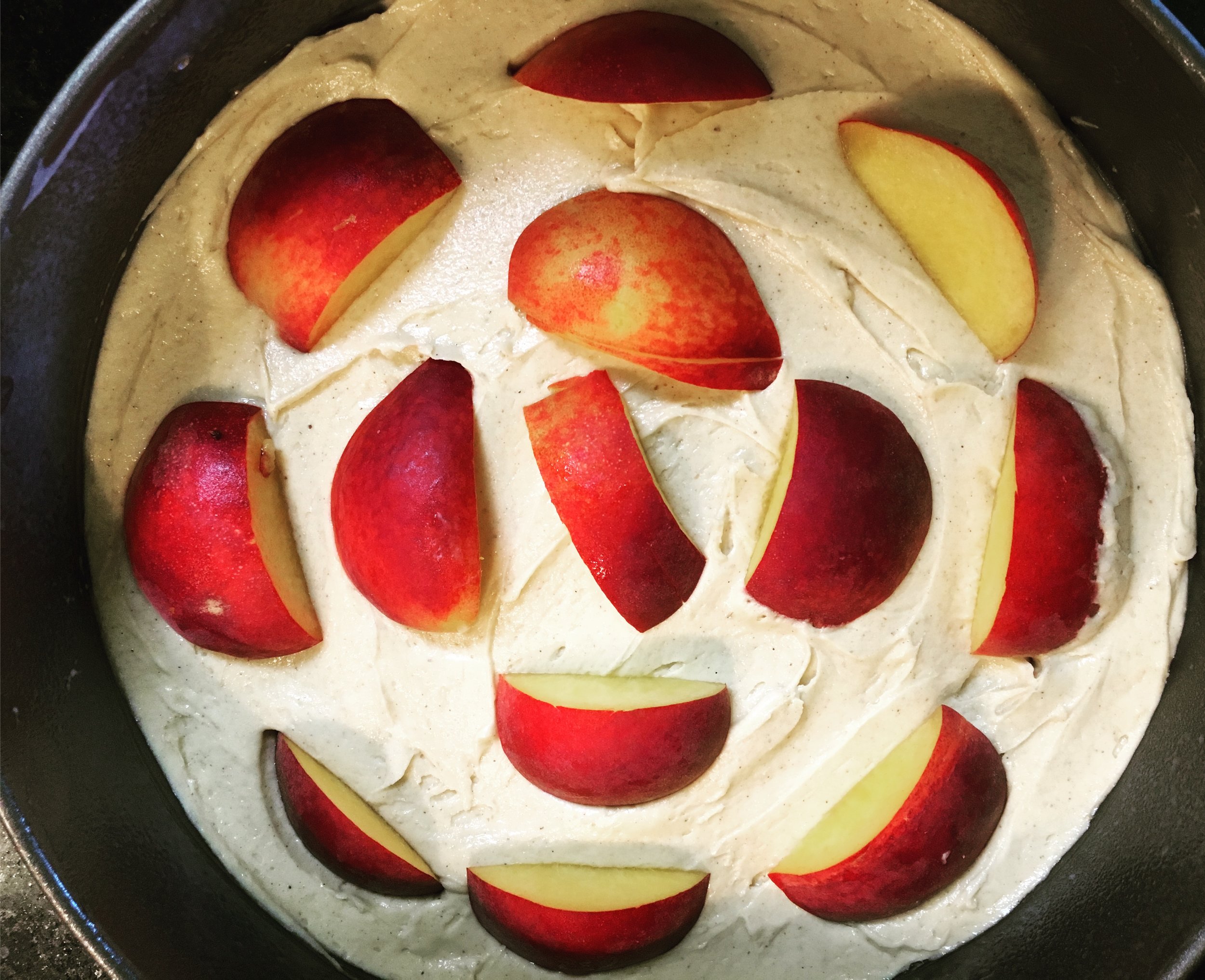 The first layer and peaches are in, ready for the next layer.