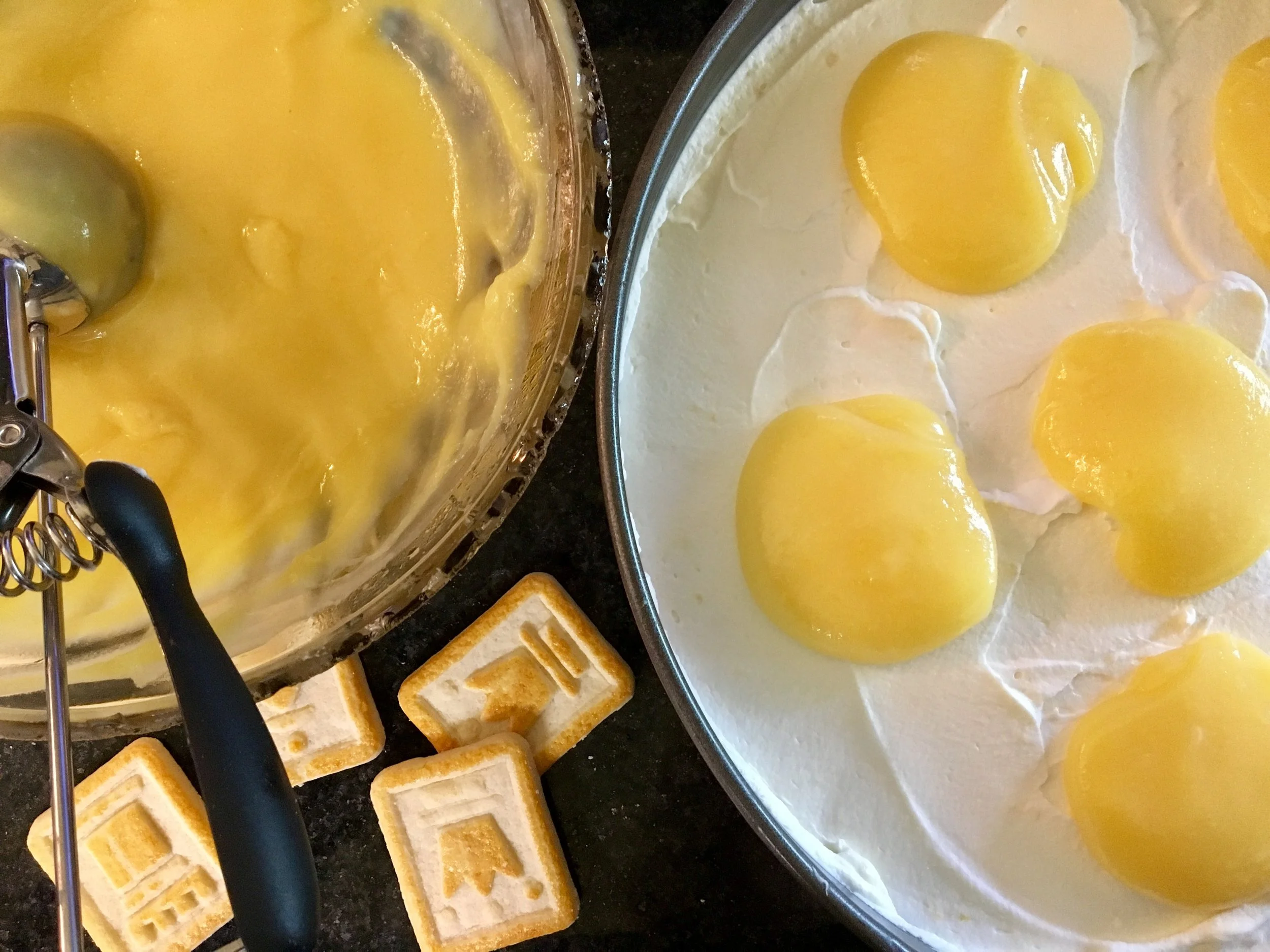Adding dollops of the lemon curd.