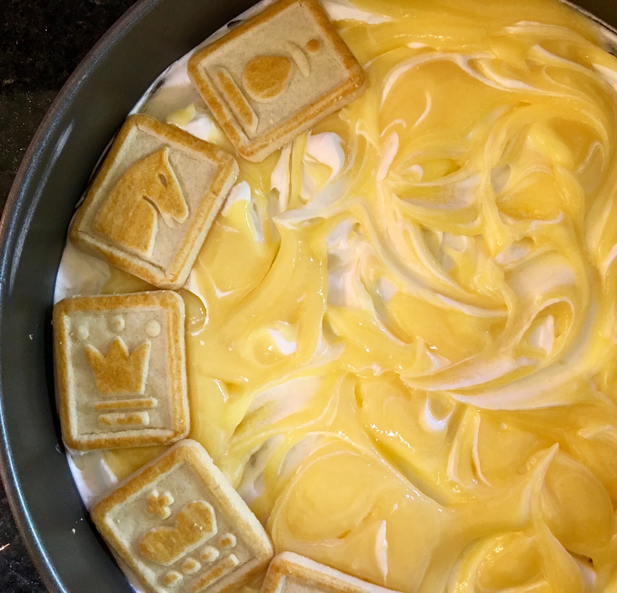 Swirl in the Curd, and layer on the Chessmen Cookies.