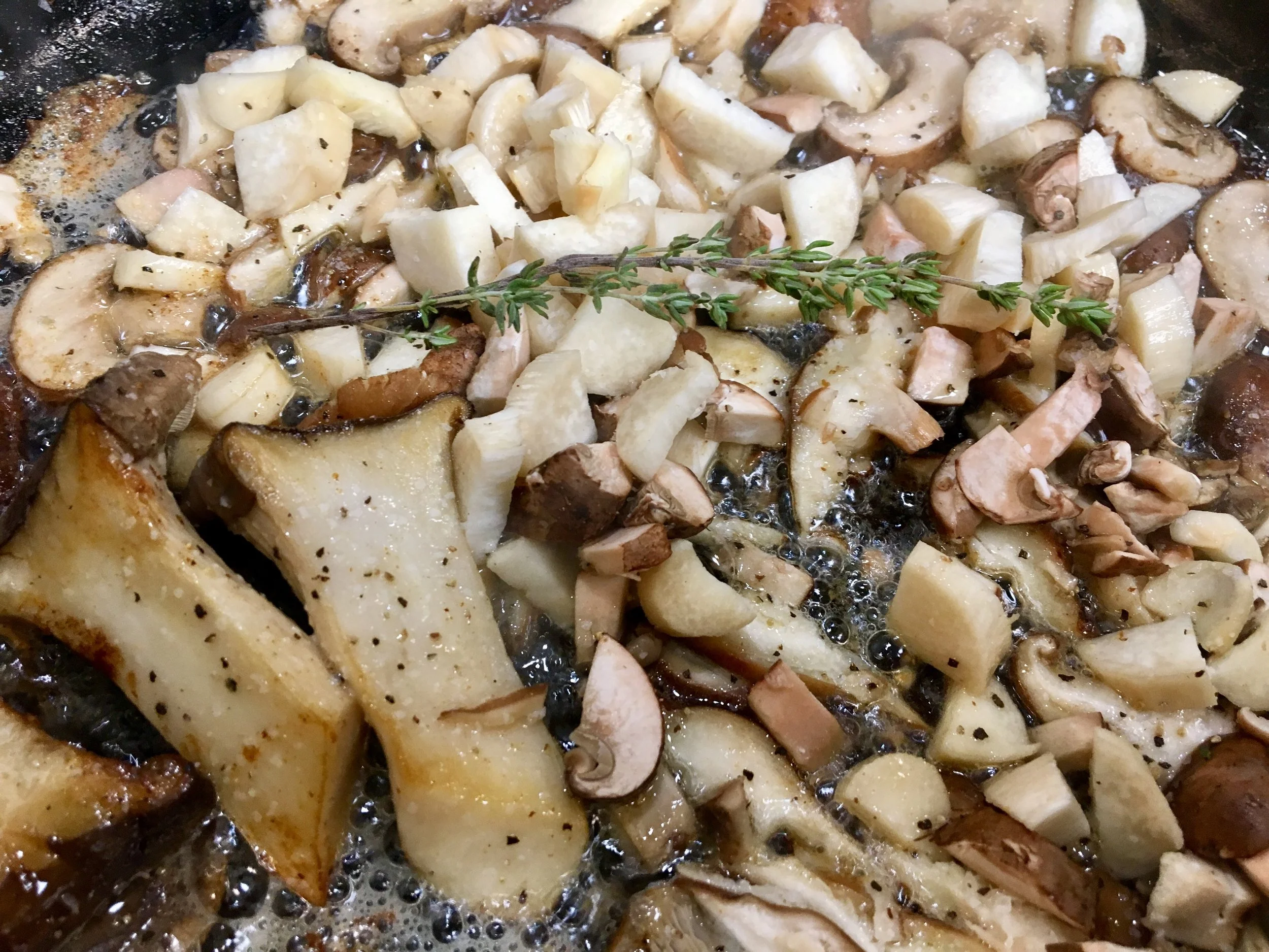 Sautéing (browning) the mushrooms.