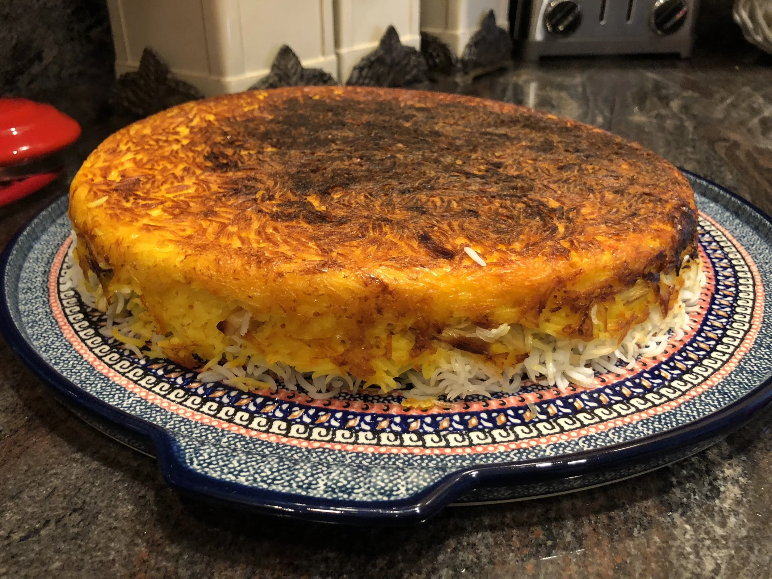 Tachin at my cousin's home, baked on the stove top.