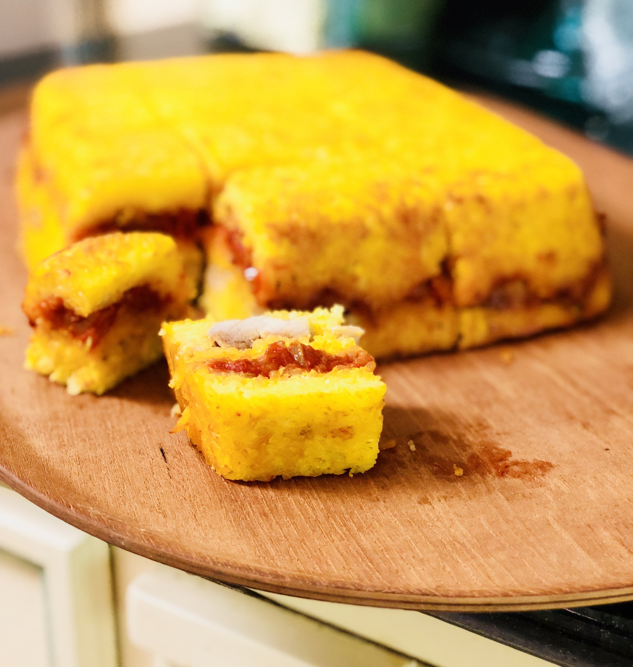 Once the final layer of chicken and saffron rice has been added, cover and bake... then FLIP!