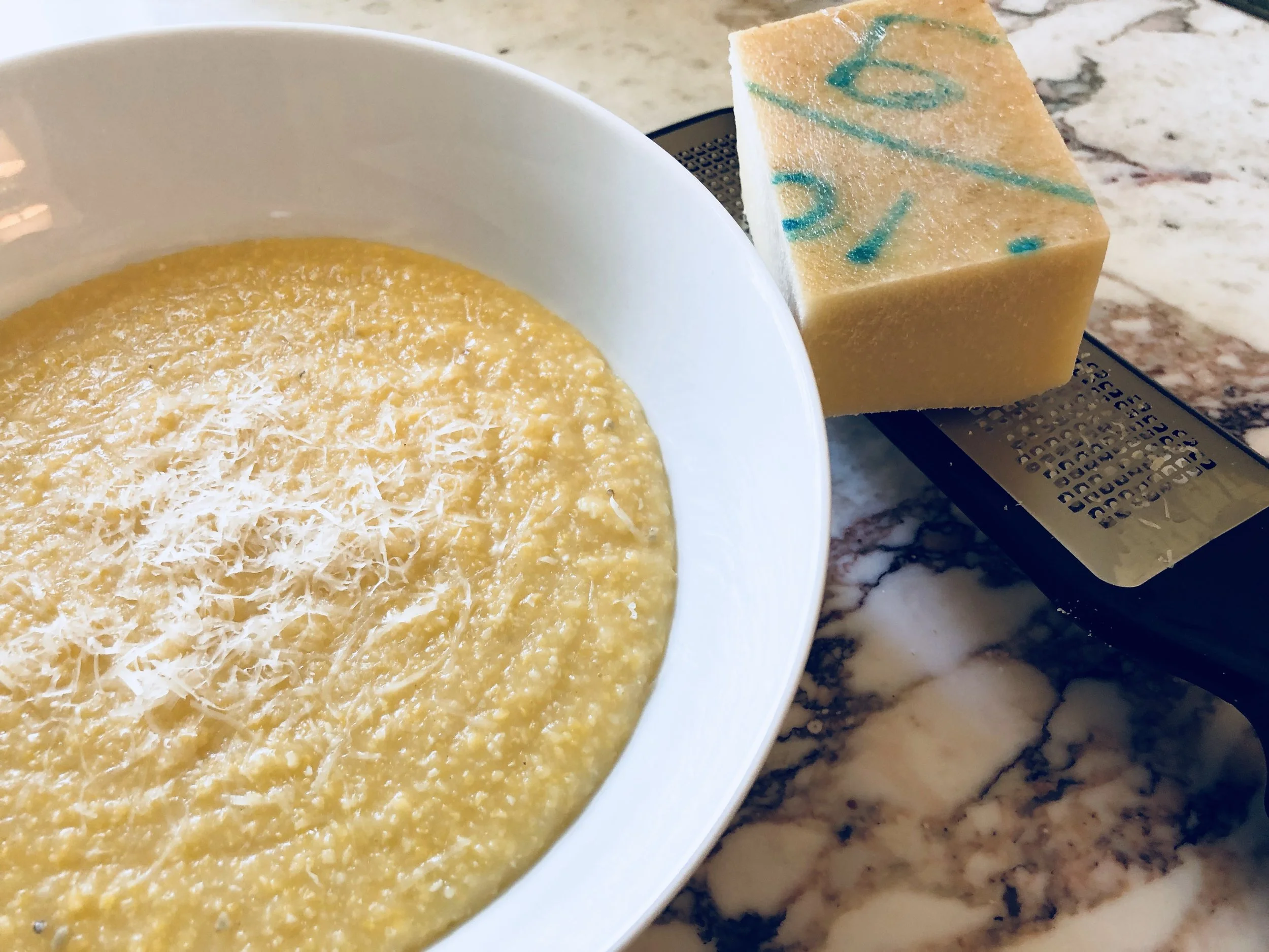 Even on it’s own, soft and creamy polenta loaded with lots of Parmigiano-Reggiano is amazing!