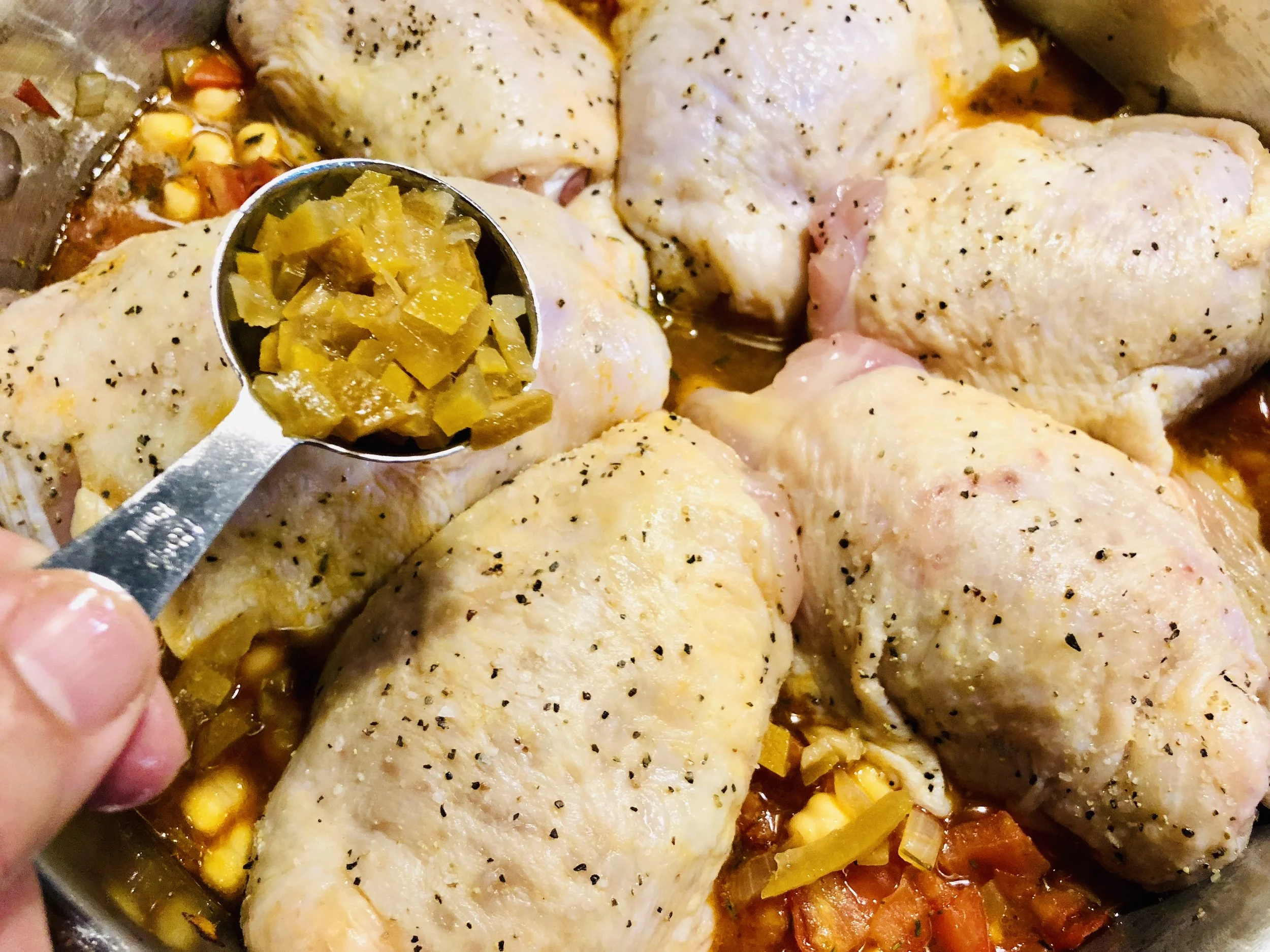 Adding the diced preserved lemon.