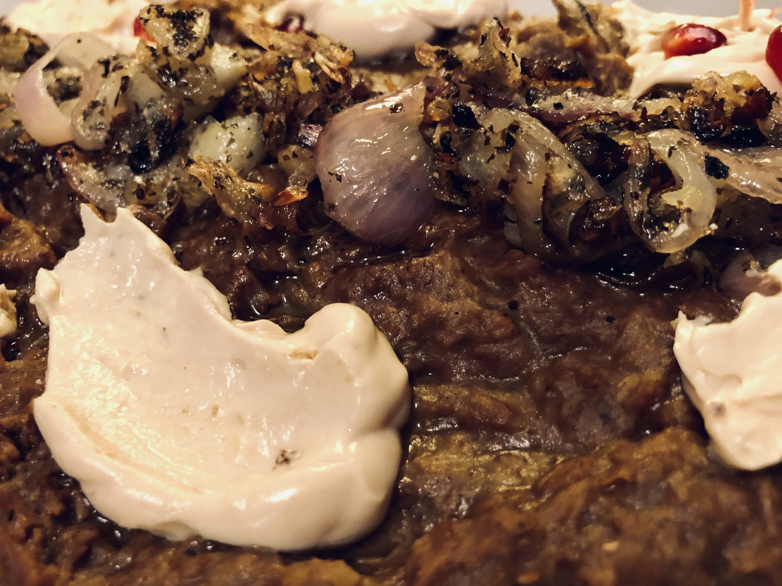 Tangy Kashk along with the fried shallots and mint on top adds the perfect finish to this dish.