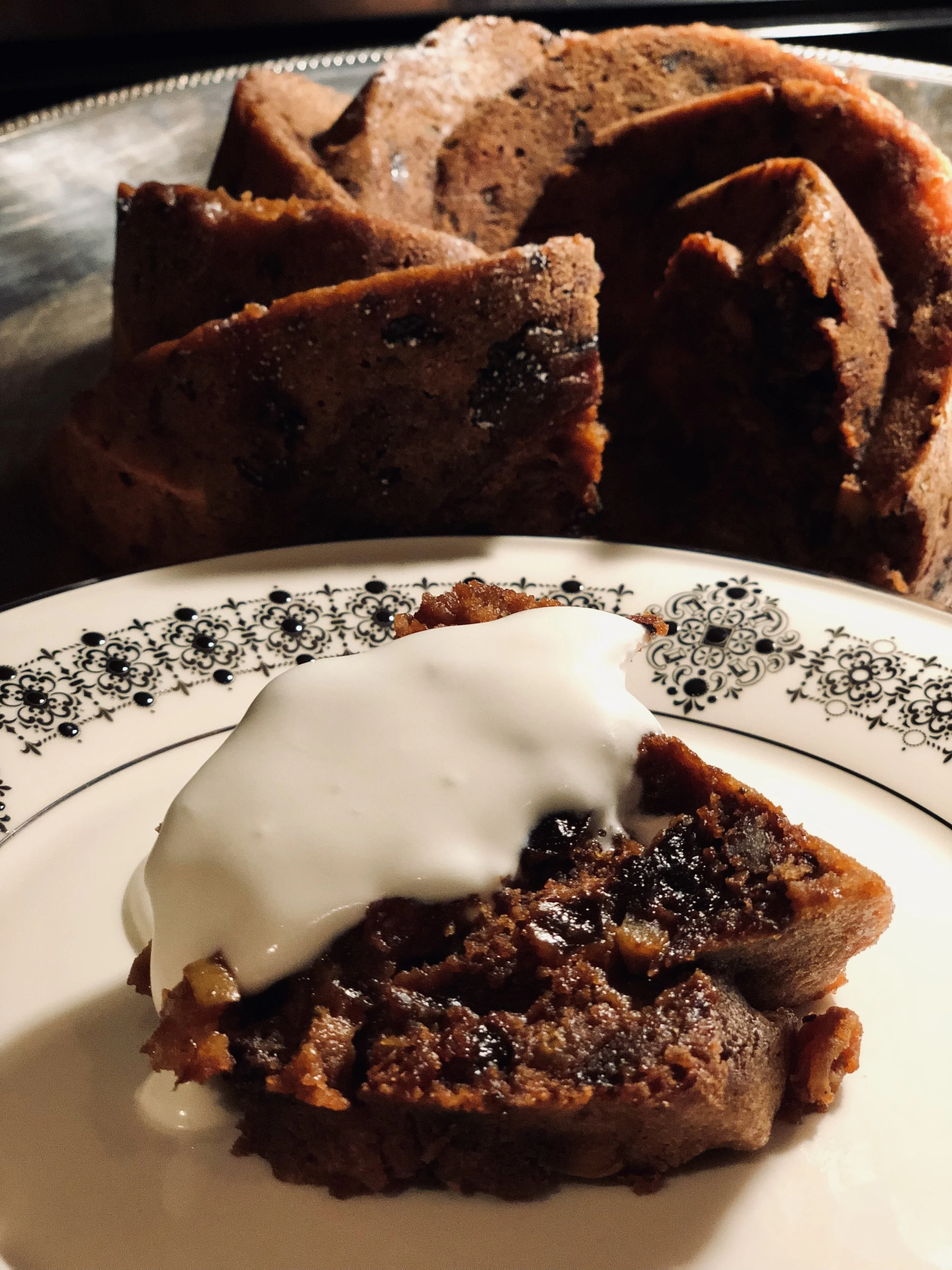 Slice warm and drizzle with lightly whipped cream/
