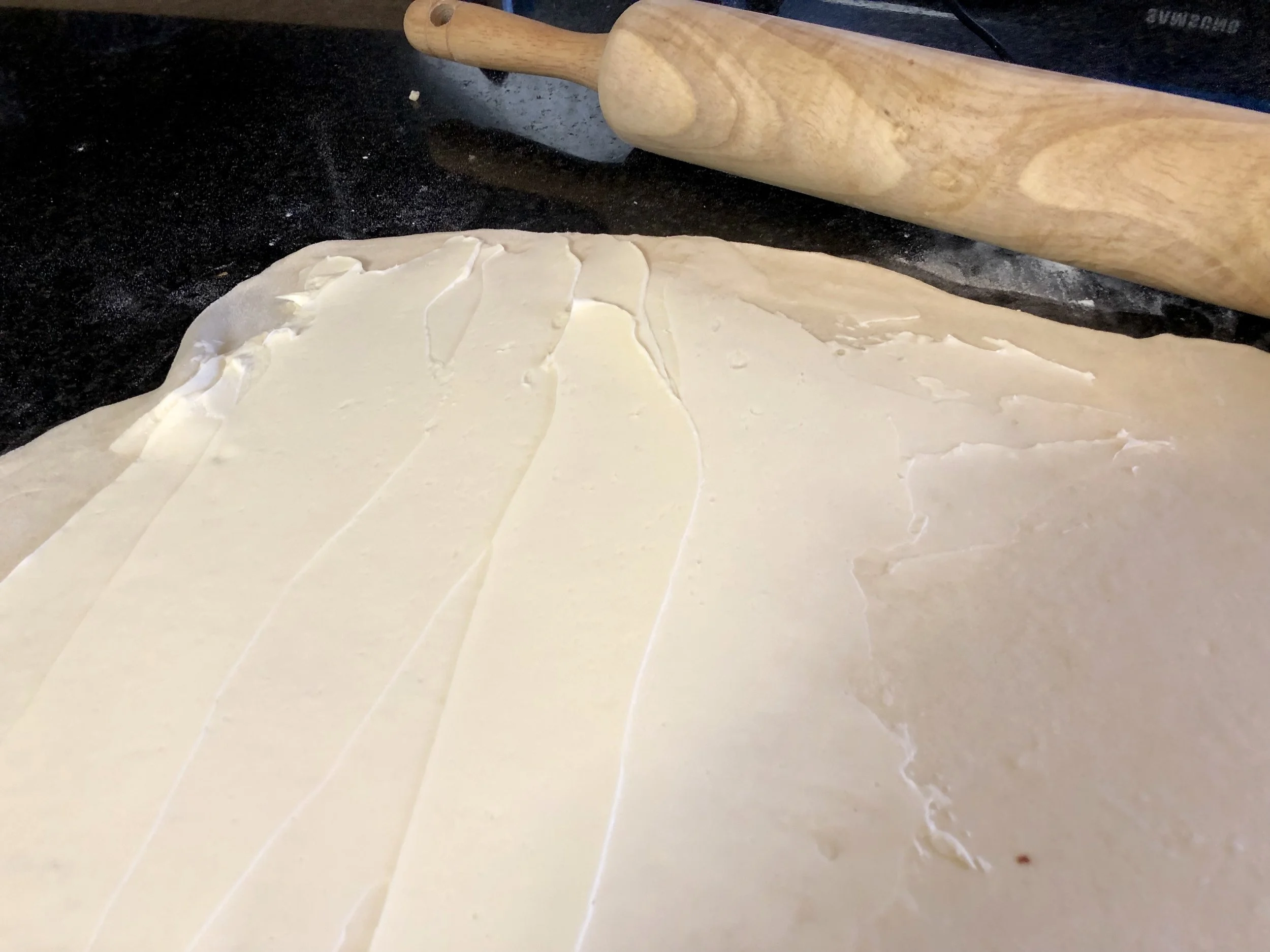 Soft butter smooth out onto the dough